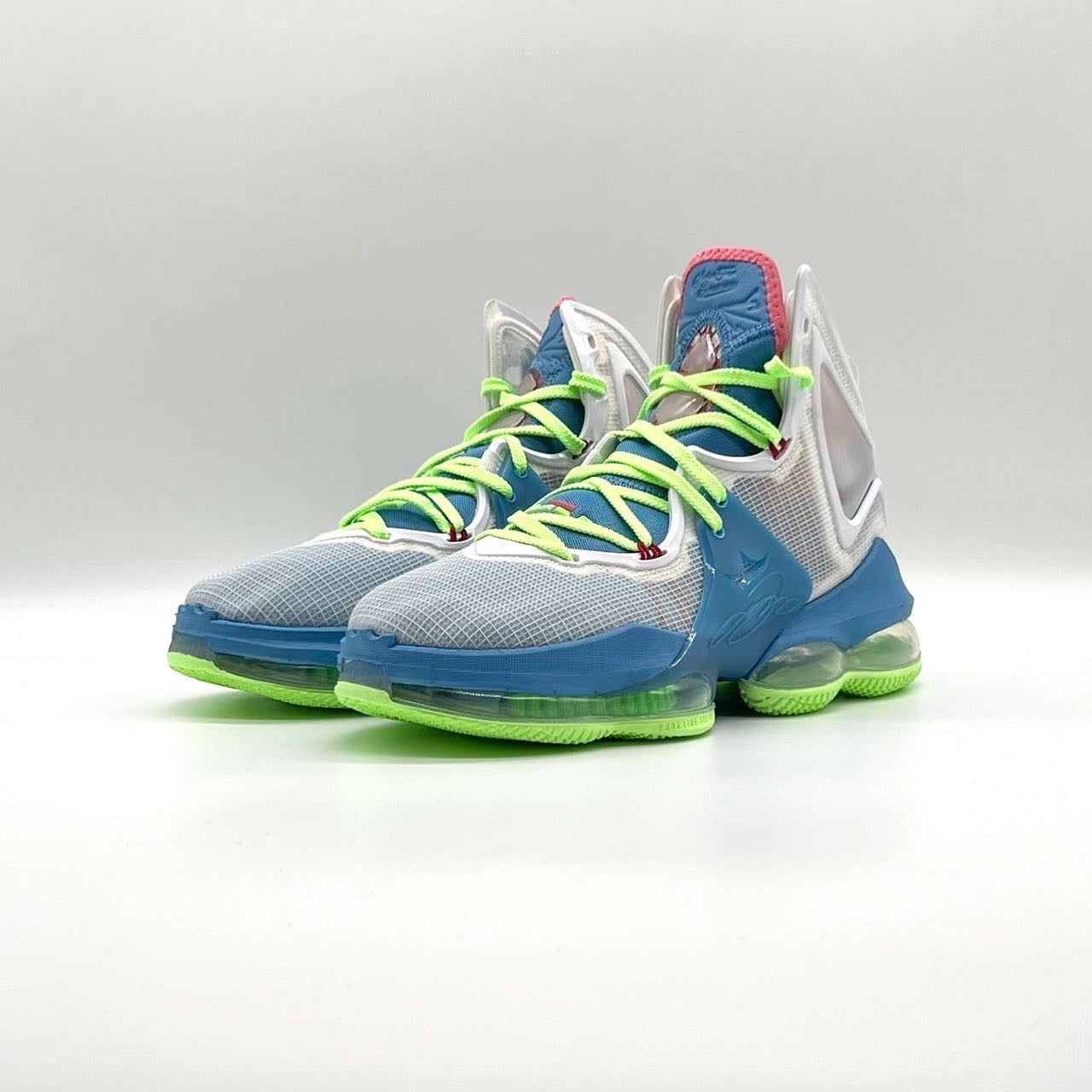 blue and lime green lebrons